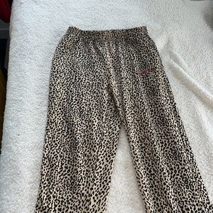 Tiger print pants with “classy babe” text